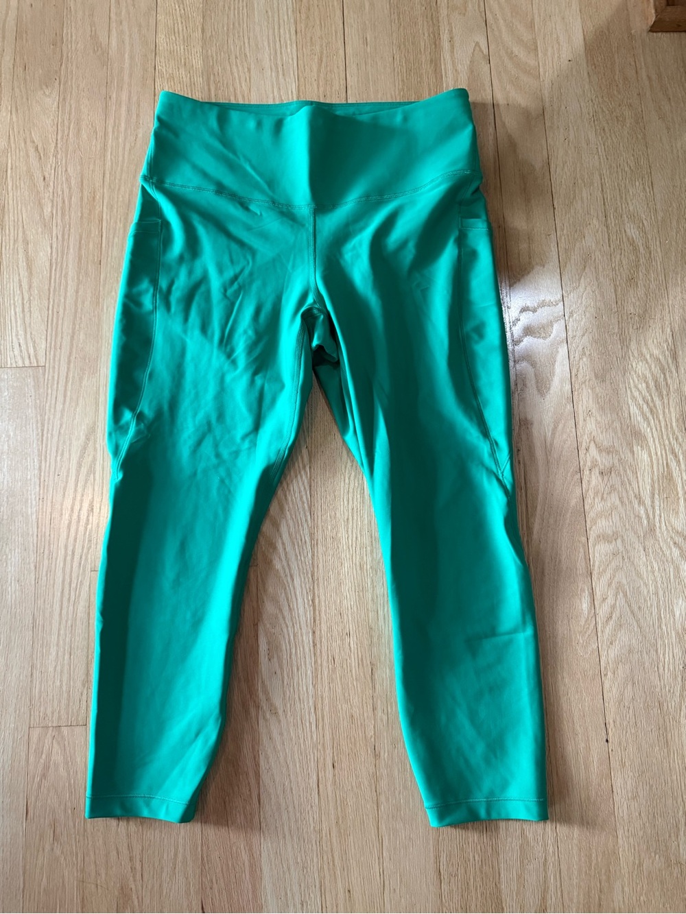 Athleta Green Interval Stash Performance Leggings 7/8 length